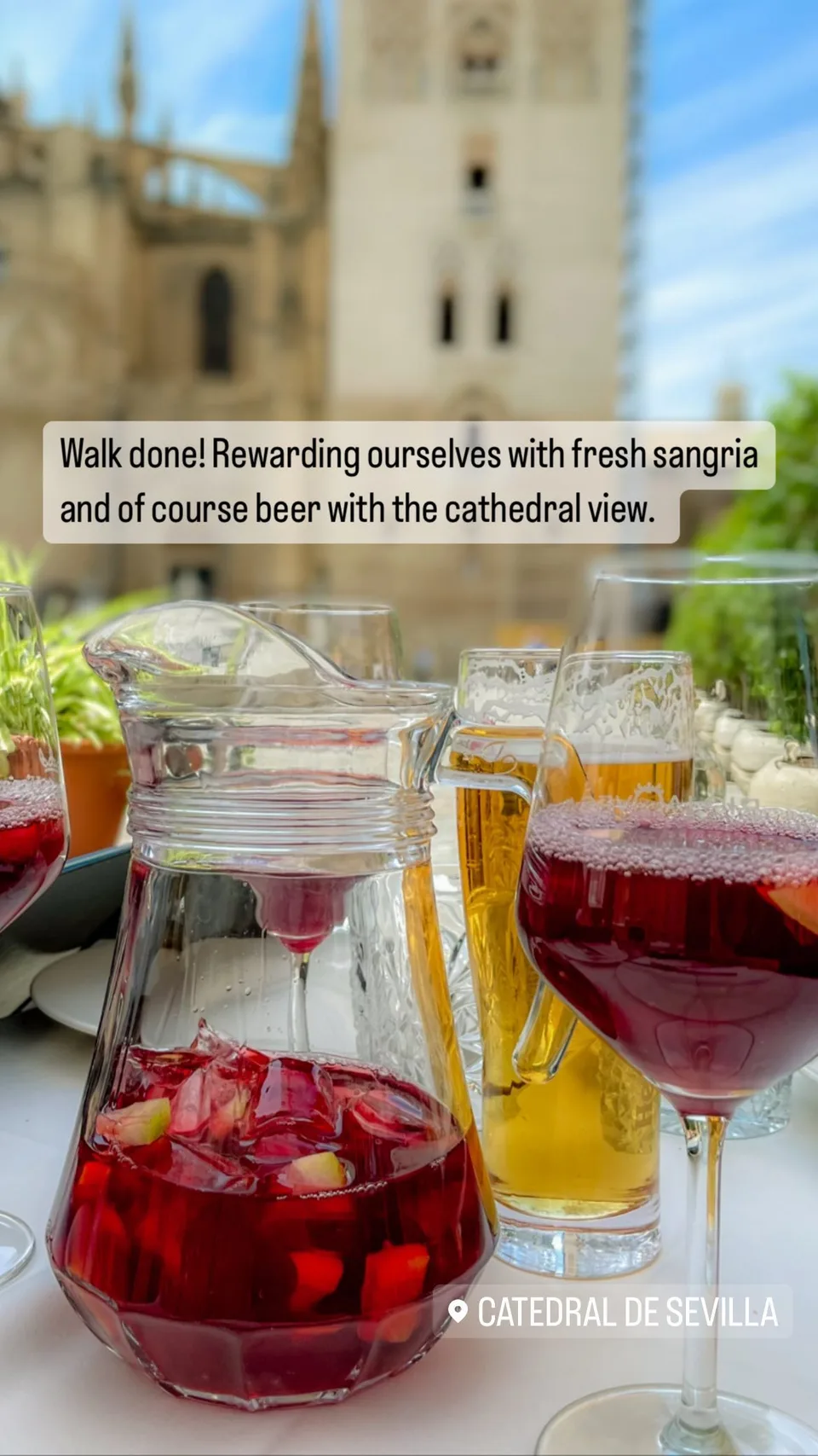 Walk done! Rewarding ourselves with fresh sangria and of course beer with the cathedral view.