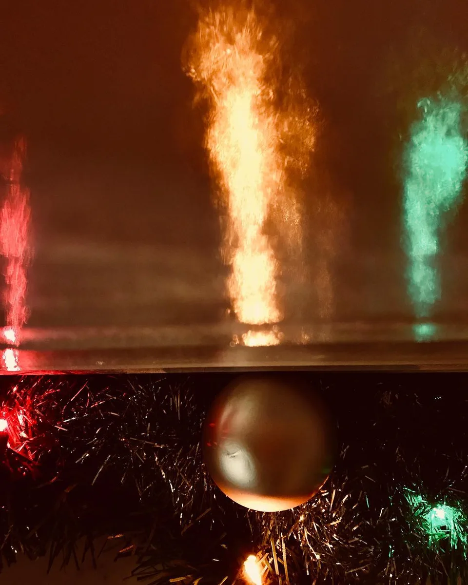 Catch some fire! #reflections #cameraangle #perspective #christmaslights…, 1 of 1