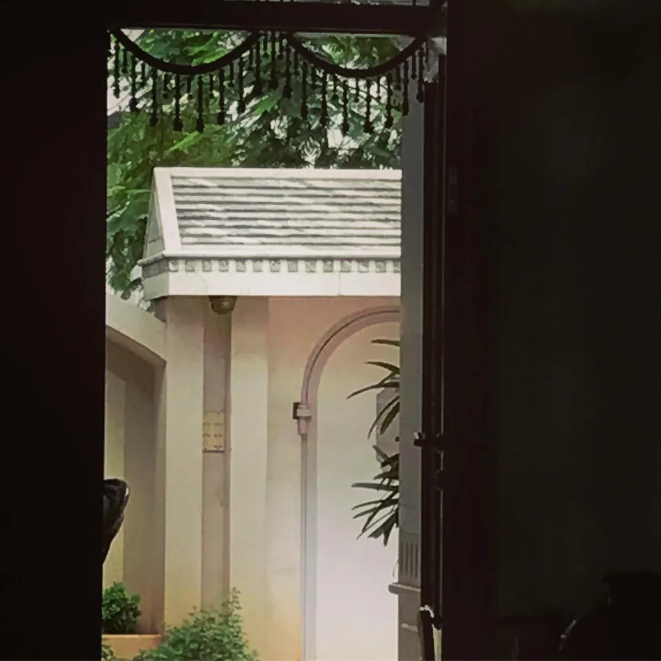 Peeking through... #doors #morningtea #viewfromwhereiam #monsoon #punecity…, 1 of 1