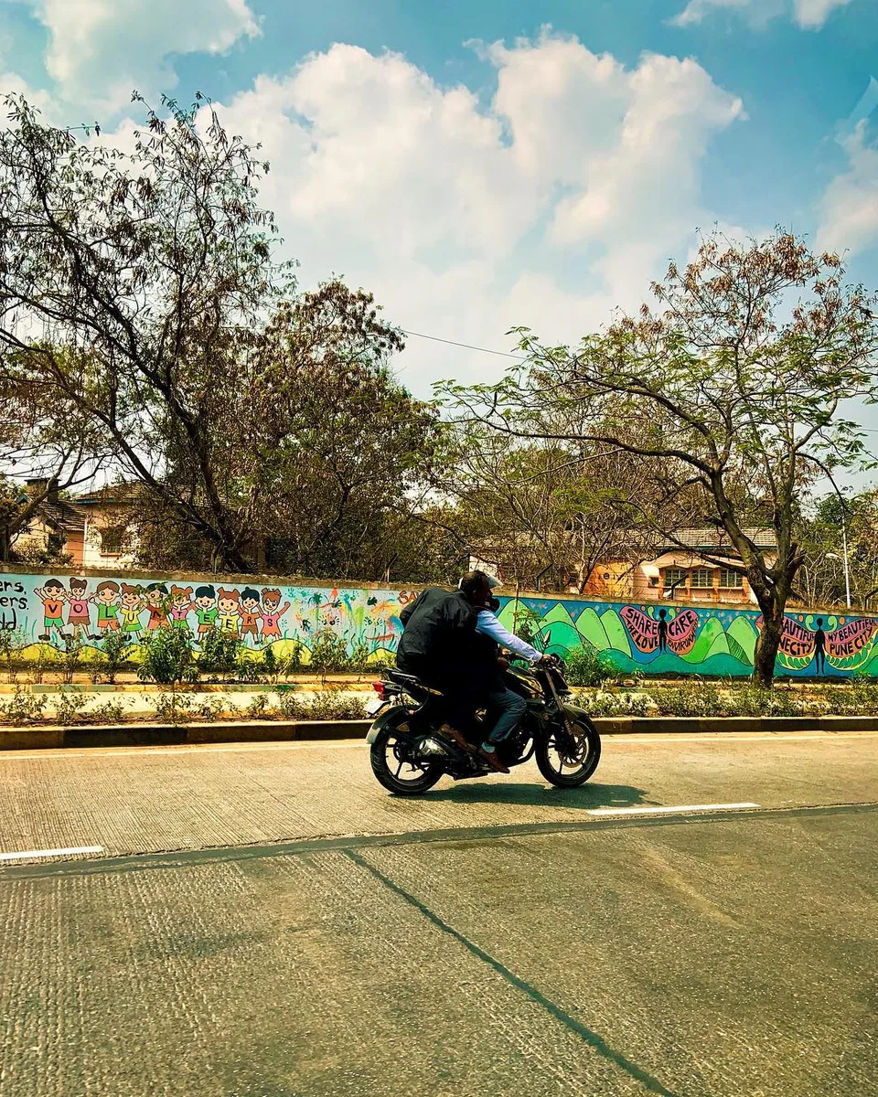 Blue skies. White puffy clouds. Sun kissed streets. Street art. And moving…, 1 of 1