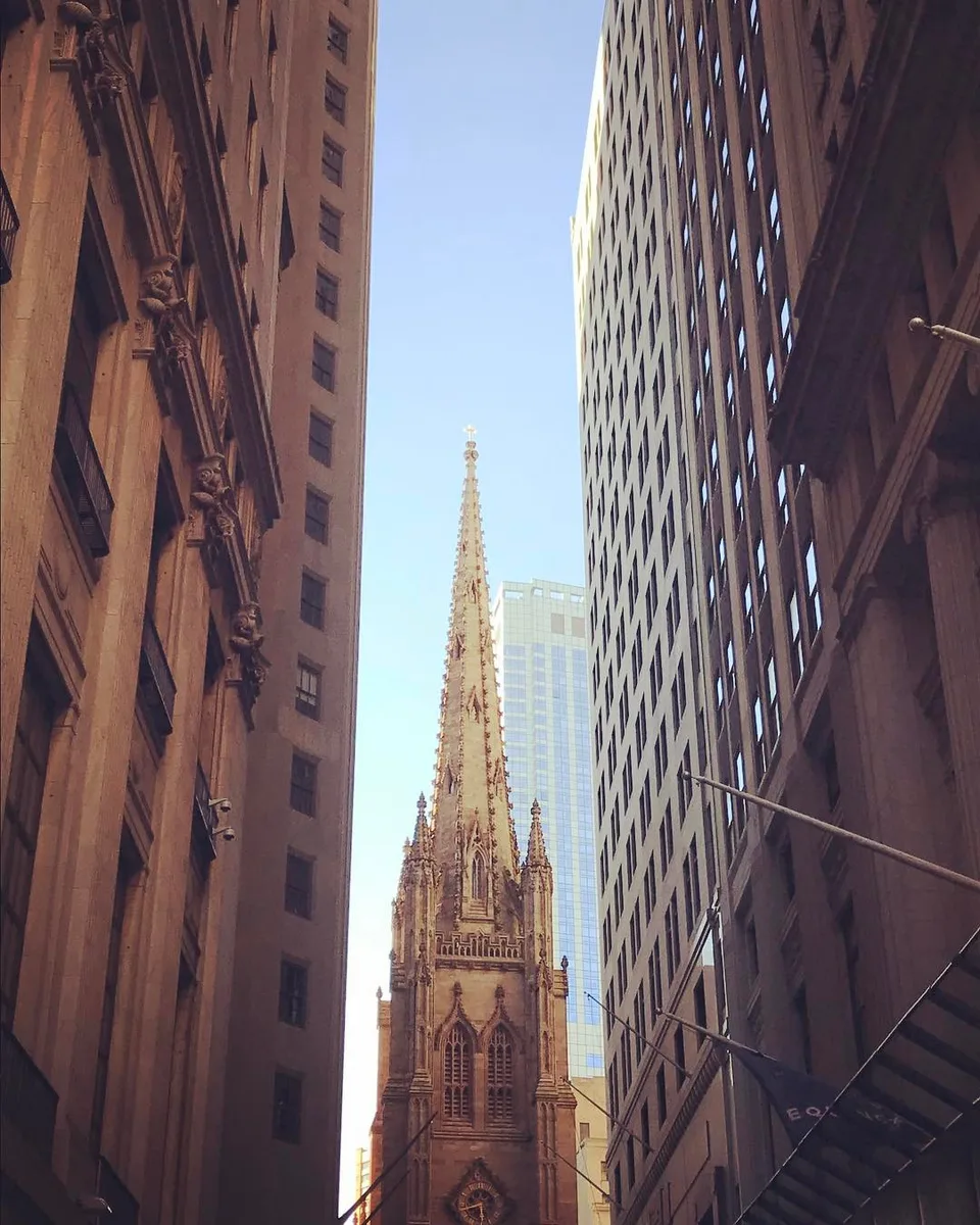 Peeking with faith... #trinitychurch #wallstreet #downtown #manhattan #newyork…
