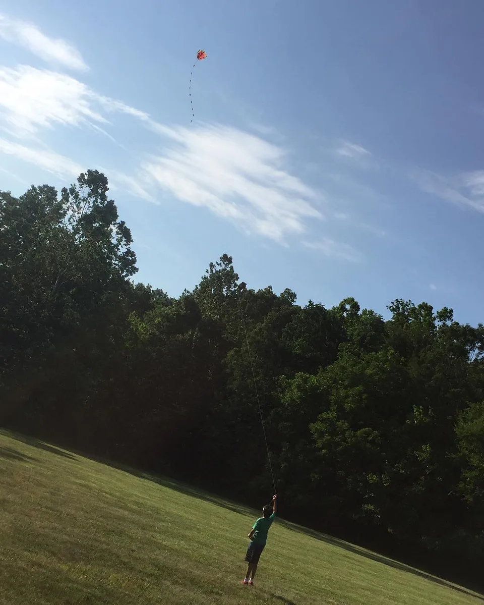 A boy and his kite... #summer #kite #summerbreak #summerbreeze #bluesky…, 1 of 1
